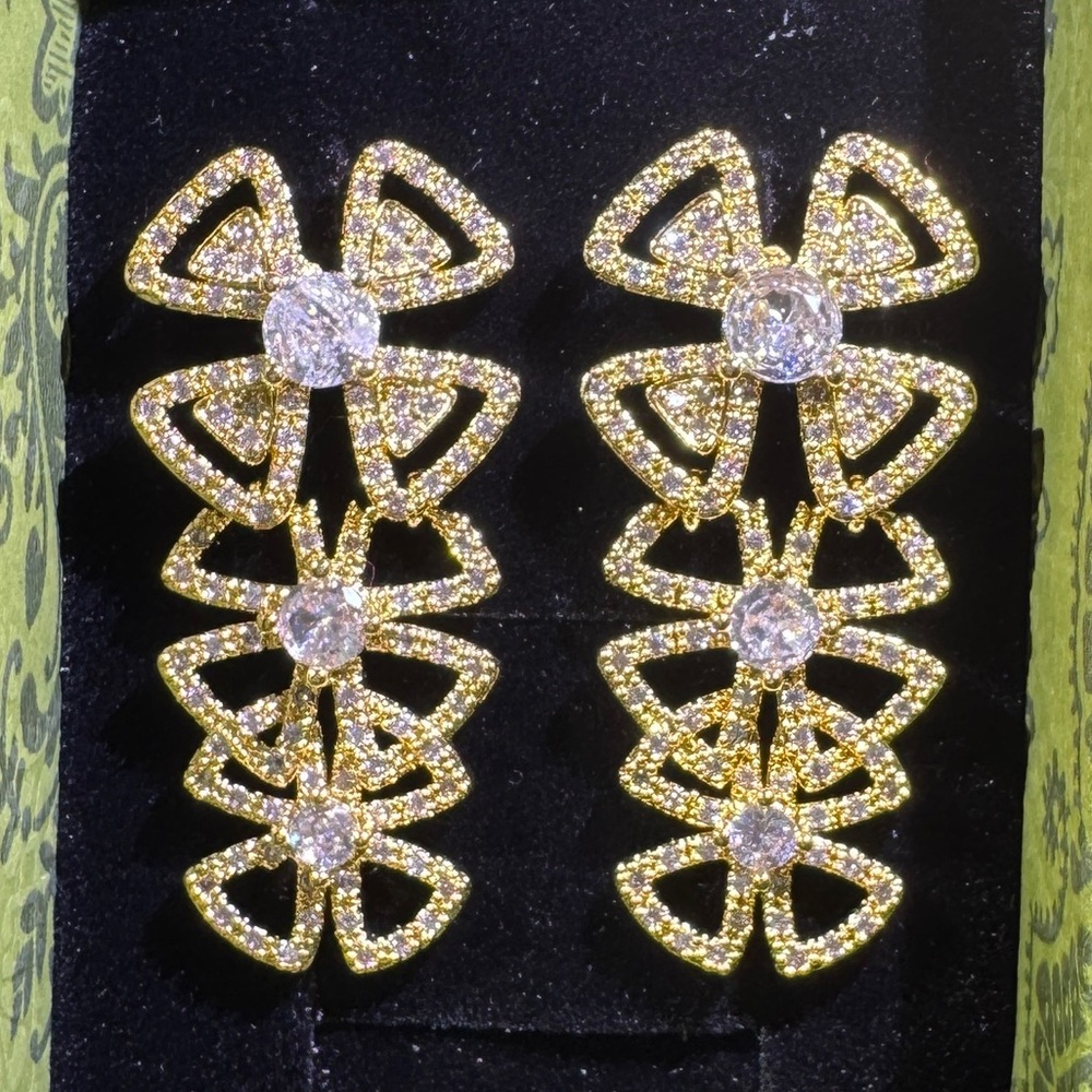 Elegant Gold and Silver Bow Earrings